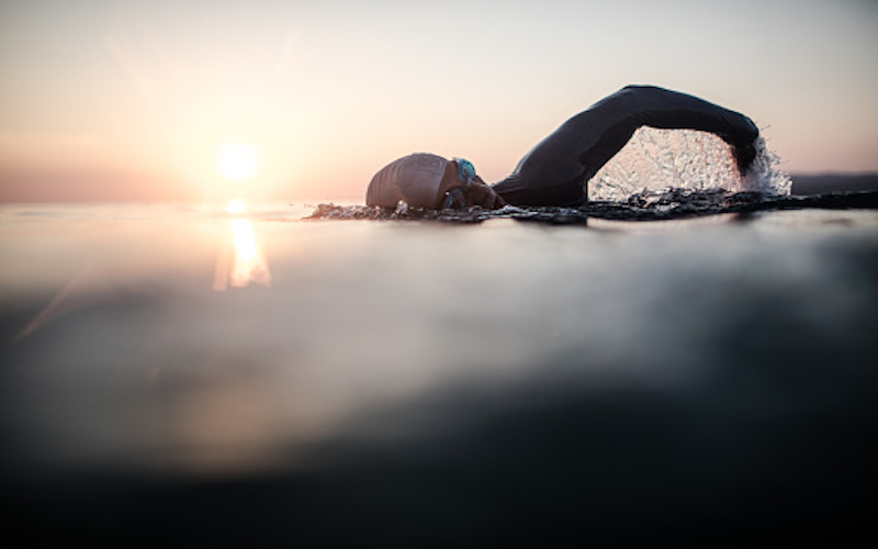 Portrait of a determined male swimmer in action