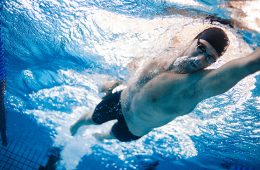 swimmer in the water doing bubbles